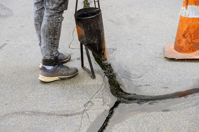Seal Coating vs Crack Sealing